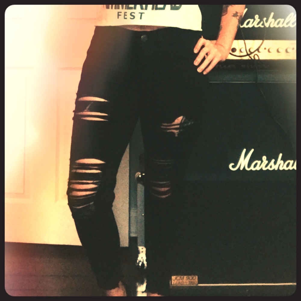 Black distressed American Eagle jeans.